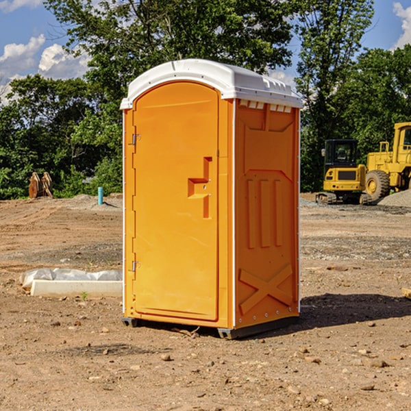 how often are the portable restrooms cleaned and serviced during a rental period in Manlius Illinois